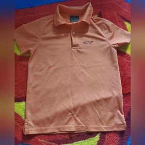 Greg Norman orange polo shirt size 6-7 worn only once in excellent condition
